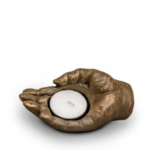 keramische mini art urne liegende hand